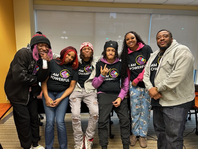 five face to face youth leaders sitting together at safezone in st paul minnesota as they record their visions for their futures with tek burch